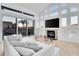 Spacious living room features fireplace and access to a waterfront balcony at 6113 Pasadena Point Blvd, Gulfport, FL 33707