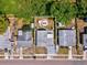 Aerial view of property showing the house, yard, patio with furniture, and surroundings at 6508 S West Shore Cir, Tampa, FL 33616