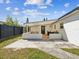 Outdoor patio area featuring outdoor seating and a covered area for dining at 6508 S West Shore Cir, Tampa, FL 33616