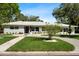Charming single-story home featuring a landscaped front yard and a freshly painted exterior at 6531 2Nd N Ave, St Petersburg, FL 33710