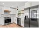 Well-equipped kitchen showcasing stainless steel appliances, white cabinetry, and modern finishes at 6531 2Nd N Ave, St Petersburg, FL 33710