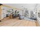 Spacious living room featuring an open layout, a kitchen island with bar seating, and modern decor at 6531 2Nd N Ave, St Petersburg, FL 33710