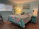 Charming bedroom with wood-look floors and lots of natural light at 665 54Th S St # 133, Gulfport, FL 33707