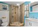 Bathroom featuring tiled shower, toilet, vanity and modern decor at 6923 Stones Throw N Cir # 4205, St Petersburg, FL 33710