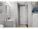 Bright bathroom with sleek vanity, modern fixtures, and a decorative mirror offering a clean, updated aesthetic at 6923 Stones Throw N Cir # 4205, St Petersburg, FL 33710