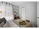 Bright bedroom with a large window, closet, and stylish decorative accents at 6923 Stones Throw N Cir # 4205, St Petersburg, FL 33710