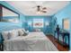 Bedroom featuring a ceiling fan, hardwood floors, modern decor and natural light at 6923 Stones Throw N Cir # 4205, St Petersburg, FL 33710