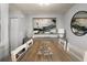 Cozy dining area with modern decor, hardwood floors, and ample natural light at 6923 Stones Throw N Cir # 4205, St Petersburg, FL 33710