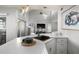 Stylish kitchen featuring stainless appliances, ample counter space, and modern lighting at 6923 Stones Throw N Cir # 4205, St Petersburg, FL 33710