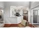 Open-concept kitchen with stainless steel appliances and access to the outdoor patio at 6923 Stones Throw N Cir # 4205, St Petersburg, FL 33710