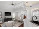 Open living area with a staircase, modern furnishings, and lots of natural light at 6923 Stones Throw N Cir # 4205, St Petersburg, FL 33710