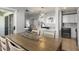 Open-concept living space with modern kitchen, dining area, and cozy seating area at 6923 Stones Throw N Cir # 4205, St Petersburg, FL 33710