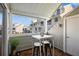 Relaxing outdoor patio area with seating, ideal for enjoying views of the community at 6923 Stones Throw N Cir # 4205, St Petersburg, FL 33710