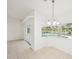 Bright dining area with large windows offering views of the pool, perfect for casual meals at 6968 De Brita Rd, North Port, FL 34291