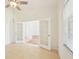 Bright office featuring glass doors, tile floors, neutral paint, and ample natural light at 6968 De Brita Rd, North Port, FL 34291