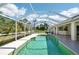 Refreshing screened-in pool for outdoor relaxation and enjoyment of Florida weather at 6968 De Brita Rd, North Port, FL 34291