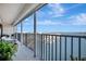 This private balcony offers expansive waterfront views, creating a serene retreat for relaxation and enjoying the coastal scenery at 7300 Sun Island S Dr # 903, South Pasadena, FL 33707