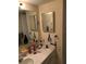 Small bathroom features white sink and cabinet, neutral walls, and ample countertop space at 7526 Needle Leaf Pl # 30, Tampa, FL 33617