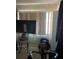 Bedroom view with a window and blinds, equipment, and closet on the right at 7526 Needle Leaf Pl # 30, Tampa, FL 33617