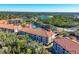 Drone's view of the community's buildings, lakes, and natural surroundings at 7710 Lake Vista Ct # 205, Lakewood Ranch, FL 34202