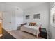 Bedroom with daybed and wood-look floors, perfect for guests or as a flexible space at 7710 Lake Vista Ct # 205, Lakewood Ranch, FL 34202