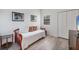 Bedroom with daybed and wood-look floors, perfect for guests or as a flexible space at 7710 Lake Vista Ct # 205, Lakewood Ranch, FL 34202