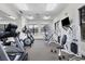 Community gym featuring modern exercise equipment including treadmills, elliptical machines, and weight training stations at 7710 Lake Vista Ct # 205, Lakewood Ranch, FL 34202