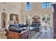 Comfortable lounge area featuring elegant furniture and expansive windows for natural light at 7710 Lake Vista Ct # 205, Lakewood Ranch, FL 34202