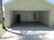 Spacious two-car garage with ample room for parking and storage, offering convenience and organization at 10535 Opus Dr, Riverview, FL 33579