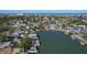 Stunning aerial view of waterfront property with boat docks and gulf views, perfect for boaters at 1101 Bay Pine Blvd, Indian Rocks Beach, FL 33785