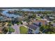 Waterfront home with lush landscaping, private boat dock, and stunning water views from multiple vantage points at 1101 Bay Pine Blvd, Indian Rocks Beach, FL 33785