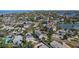 Beautiful waterfront property with a private dock, lovely waterway access and manicured landscaping at 1101 Bay Pine Blvd, Indian Rocks Beach, FL 33785