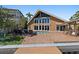 Beautiful backyard with a pool, waterfront views, brick patio, and ample space for outdoor entertaining at 1101 Bay Pine Blvd, Indian Rocks Beach, FL 33785