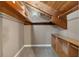 Organized walk-in closet with custom shelving, maximizing storage and space, located near the main bathroom at 1101 Bay Pine Blvd, Indian Rocks Beach, FL 33785