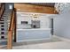 Modern kitchen features white cabinets, stainless steel appliances, quartz countertops, and pendant lighting at 1101 Bay Pine Blvd, Indian Rocks Beach, FL 33785