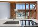 Gourmet kitchen boasts stone countertops and stainless steel appliances with a pool view at 1101 Bay Pine Blvd, Indian Rocks Beach, FL 33785