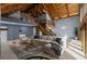 Spacious living room features wood ceilings, staircase, soft natural light, and comfortable seating at 1101 Bay Pine Blvd, Indian Rocks Beach, FL 33785