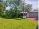 The home boasts a lovely backyard and screened-in porch at 11233 51St N Ave, St Petersburg, FL 33708