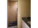 A clean bathroom featuring granite counters, a modern vanity, and tiled shower at 11233 51St N Ave, St Petersburg, FL 33708