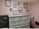 Charming bedroom with eclectic decor and ample wall art, creating a personalized space at 11233 51St N Ave, St Petersburg, FL 33708