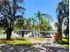 Charming single-story home with well-manicured lawn, mature trees, and a convenient carport at 11233 51St N Ave, St Petersburg, FL 33708
