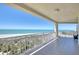 Spacious tiled balcony offers panoramic views of the pristine beach and turquoise waters at 1180 Gulf Blvd # 1201, Clearwater, FL 33767