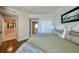 Comfortable bedroom with a view into the ensuite bathroom and closet at 1180 Gulf Blvd # 1201, Clearwater, FL 33767