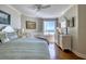 Inviting bedroom with a large window offering stunning ocean views and beautiful furnishings at 1180 Gulf Blvd # 1201, Clearwater, FL 33767