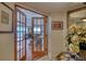 Foyer with french doors that open up to a spacious living room overlooking the ocean at 1180 Gulf Blvd # 1201, Clearwater, FL 33767