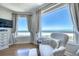 Relax and take in the ocean views from this bright living room with comfortable seating at 1180 Gulf Blvd # 1201, Clearwater, FL 33767