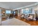 Spacious living room with comfortable seating and refined décor with ocean views at 1180 Gulf Blvd # 1201, Clearwater, FL 33767