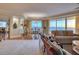 Open-plan living room showing dining area and hardwood floors with ocean view at 1180 Gulf Blvd # 1201, Clearwater, FL 33767