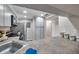Compact kitchen with stainless steel appliances and plenty of cabinet space at 1398 Shady Pine Way # H2, Tarpon Springs, FL 34688