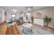 Living room with open layout flowing to dining and kitchen areas at 1398 Shady Pine Way # H2, Tarpon Springs, FL 34688